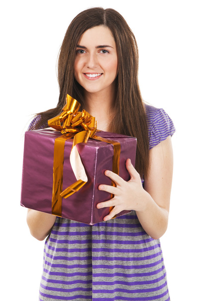 Young beautiful woman with a gift box - Фото, зображення