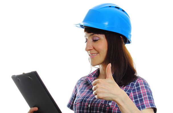 Woman in helmet holding documents and showing thumbs up - Photo, Image