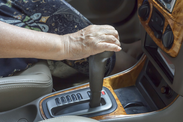 Senior woman driving a car - Фото, изображение