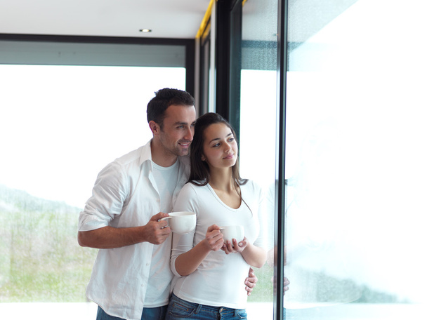 couple drinking first morning coffee - Photo, Image