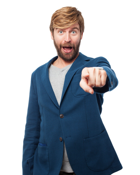 surprised businessman pointing front - Foto, immagini