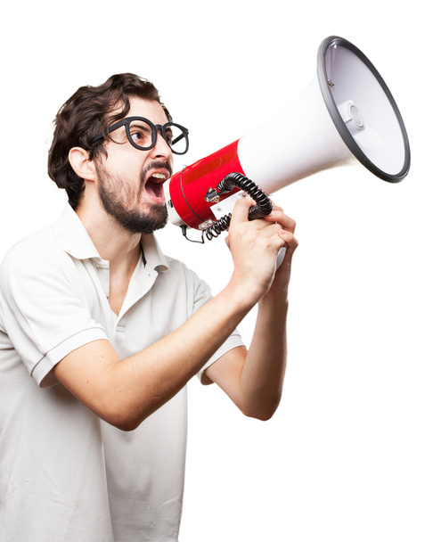 crazy young man with megaphone - 写真・画像
