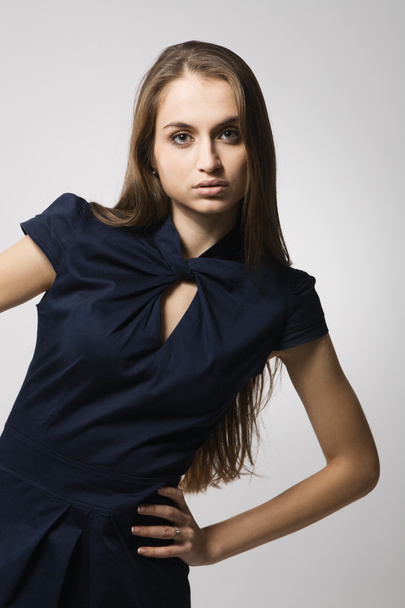 Beautiful fashion model in strict blue dress - Foto, Imagem