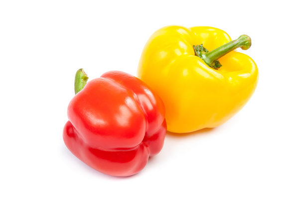 Fresh red and yellow peppers on white background. - Foto, Bild