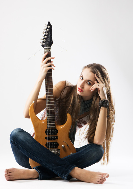 Beautiful girl with electric guitar - Photo, Image