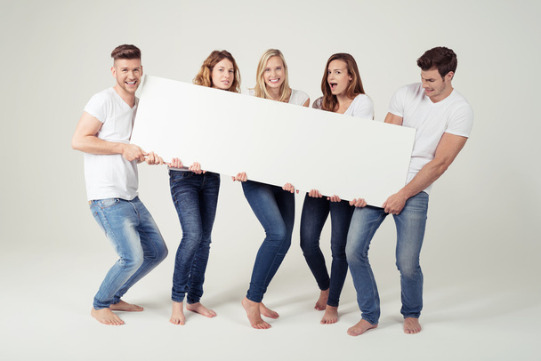 Five Friends Holding White Board with Copy Space - Fotó, kép