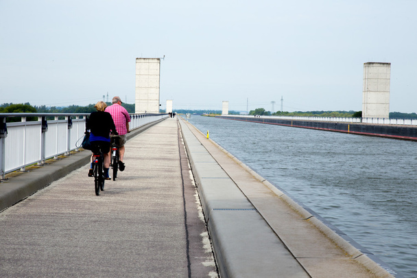 Radfahrer auf dem Kanal - Foto, Bild