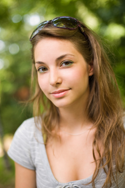 Close up portrait of a beautiful young brunette. - Photo, Image
