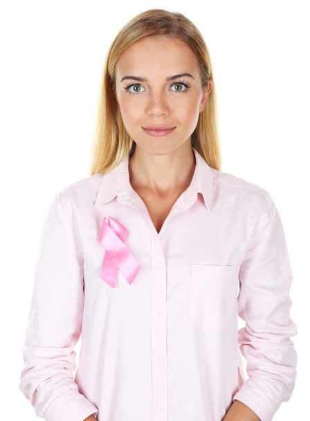 Woman using pink ribbon on her chest isolated on white - Фото, зображення