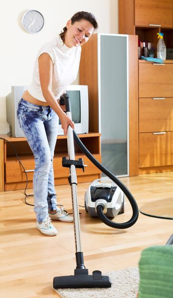 Woman with vacuum cleaner - Φωτογραφία, εικόνα