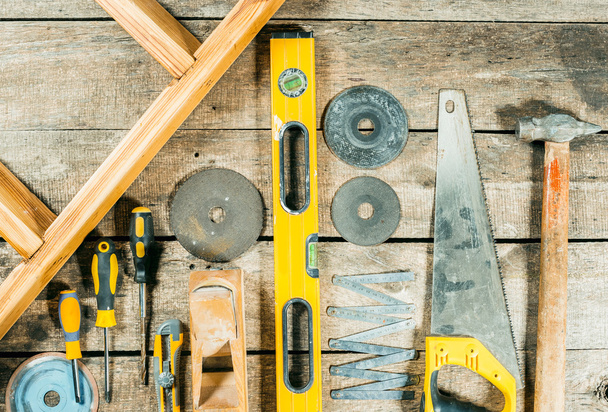 Assorted work tools on wood - Фото, зображення
