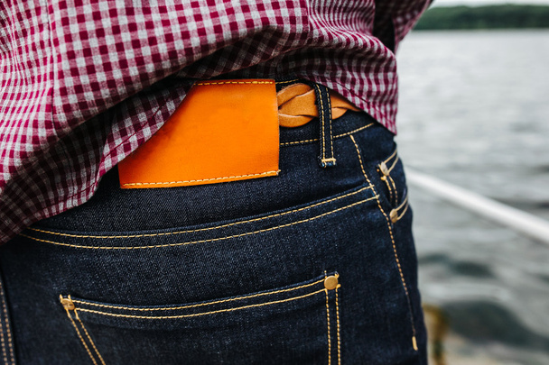 Corpo inferiore degli uomini, tasca posteriore
 - Foto, immagini