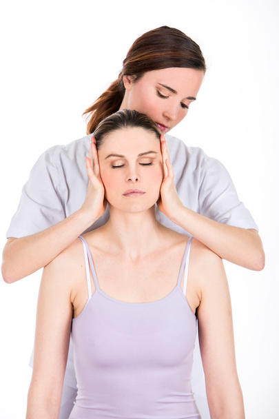 médico evaluación mujer paciente cuello
 - Foto, Imagen
