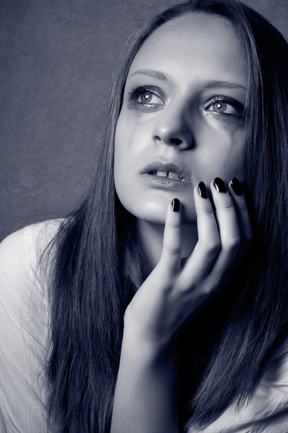 Crying young girl isolated , monochrome photo - Photo, image