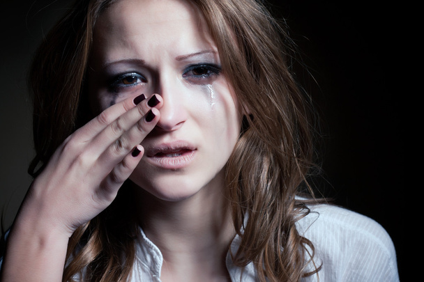 Crying young girl isolated - 写真・画像