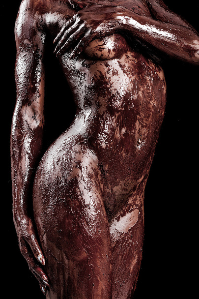 African model body portrait covered with chocolate - Фото, изображение