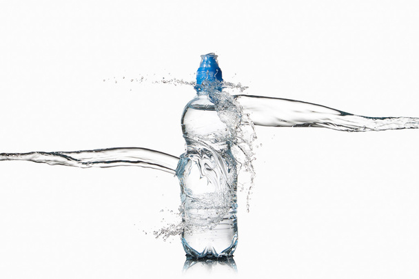 Small plastic water bottle - Foto, afbeelding
