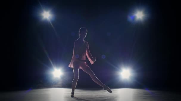 elegance ballerina standing on toes bending the back - Footage, Video