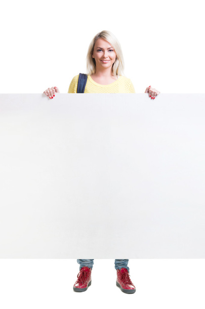 Young and attractive teenage schoolgirl isolated on white - Фото, изображение