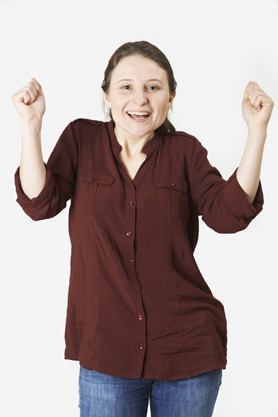 Studio Portrait Of Woman With Jubilant Expression - Photo, Image