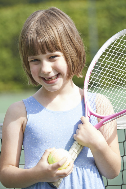 Portrait Of Young Girl Playing Tennis - Fotó, kép