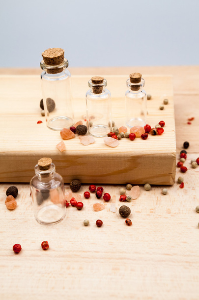 Spices and empty, small glass bottles - Φωτογραφία, εικόνα