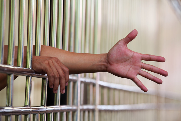 hand in de gevangenis - Foto, afbeelding