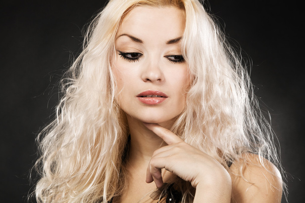 Blond model on black background - Фото, зображення