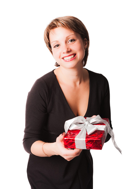 Beautiful lady holding little box with gift - 写真・画像