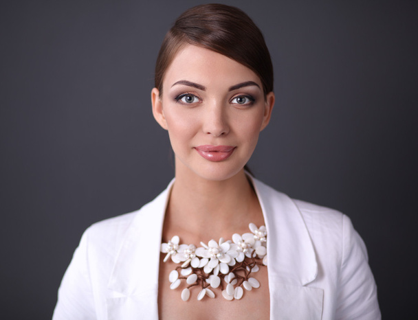 Portrait of a successful businesswoman standing in an office - Foto, imagen