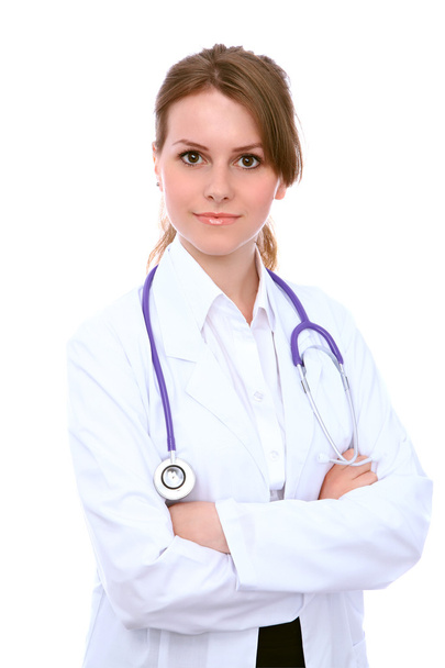 Friendly smiling young female doctor, isolated over white background - Foto, imagen
