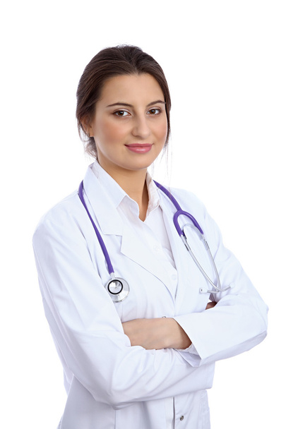 Friendly smiling young female doctor, isolated over white background - Foto, Imagem
