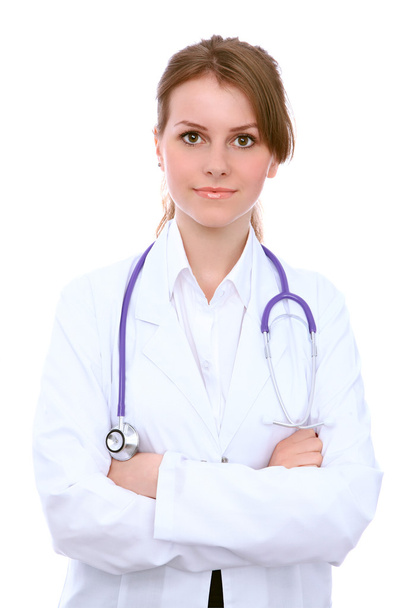 freundlich lächelnde junge Ärztin, isoliert auf weißem Hintergrund - Foto, Bild