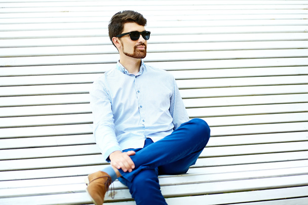 Young handsome hipster Male Student Sitting on the Bench in a Park - Foto, Imagem
