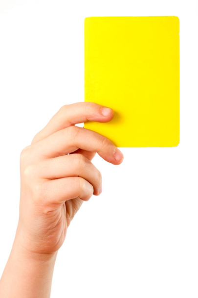 Yellow card in hand - Zdjęcie, obraz