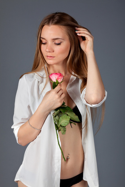 Girl with a rose - Фото, изображение