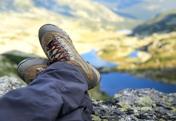 Woman Hiker Boots Resting on Mountain Peak - Photo, Image