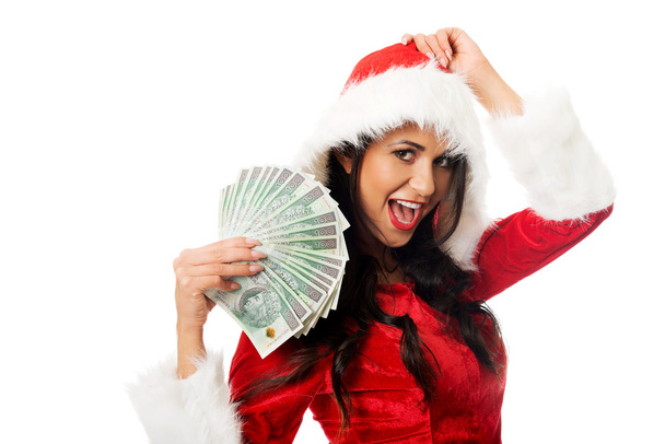 Santa woman holding a clip of polish money - Foto, Imagem