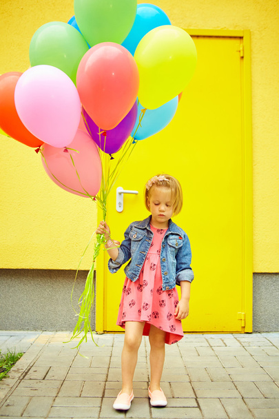 happy little girl outdoors with balloons - Fotó, kép