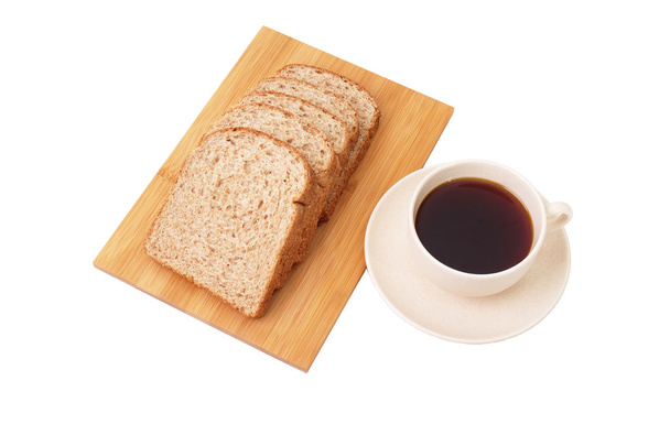Whole grain bread and grapes serve with a cup of coffee isolated on white background - Photo, Image