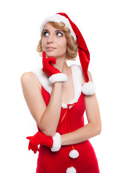 beautiful blond christmas girl thinking and smiling - isolated o - Фото, зображення