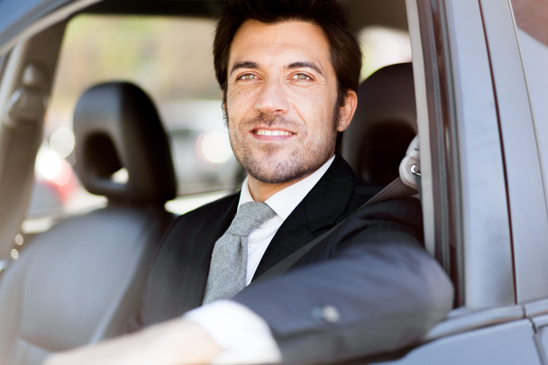 smiling businessman driving car - Foto, Imagem