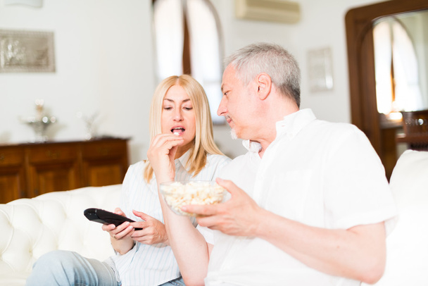mature couple watching television - Photo, Image