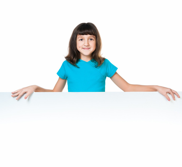 Child behind a board - Foto, Bild