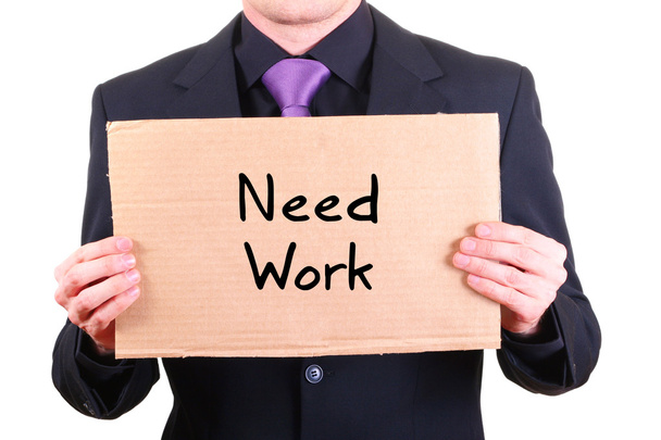 Uomo d'affari disoccupato con segno di cartone "Need Work
" - Foto, immagini