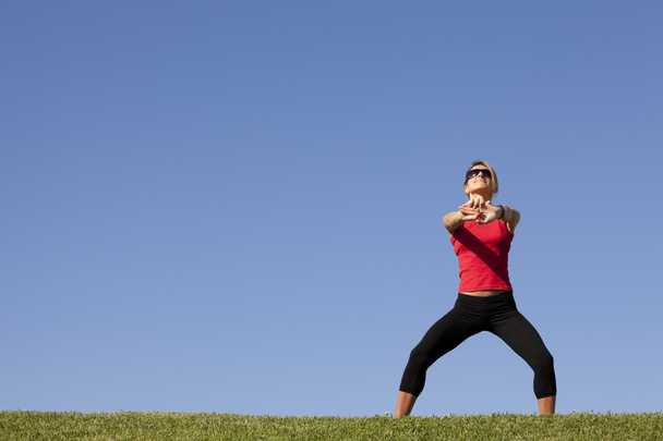 Woman doing exercise outdoor - Fotó, kép