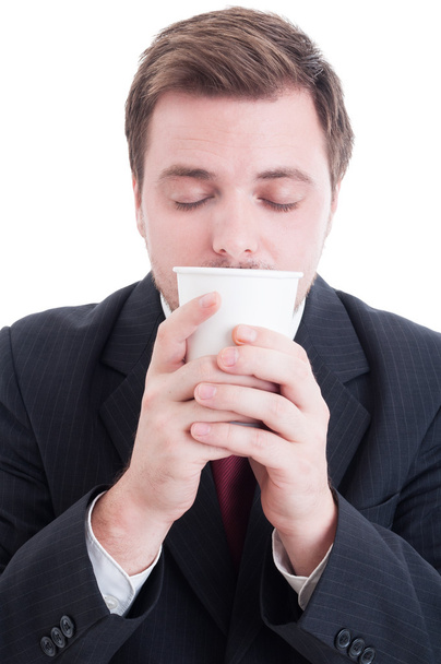 Accountant ruiken verse koffie uit een beker - Foto, afbeelding