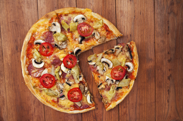 pizza on wood background - Foto, Imagen