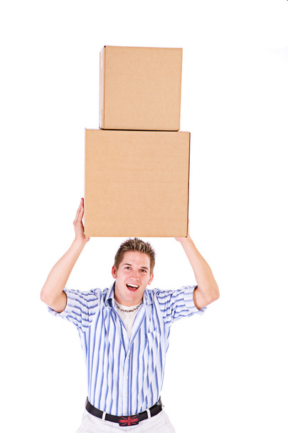 Student: Holding A Stack Of Packing Cardboard Boxes Aloft - Foto, Imagem