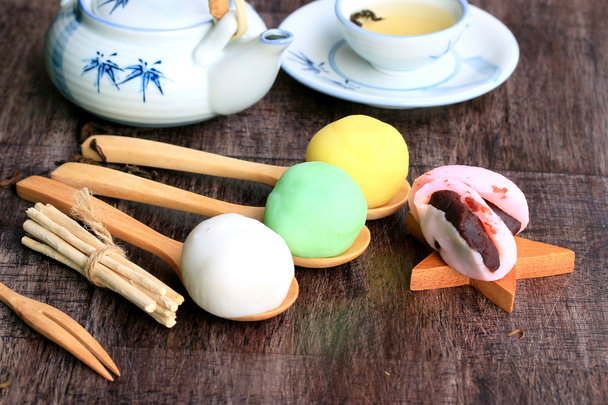 Mochi japanese dessert red bean colorful and hot tea - 写真・画像